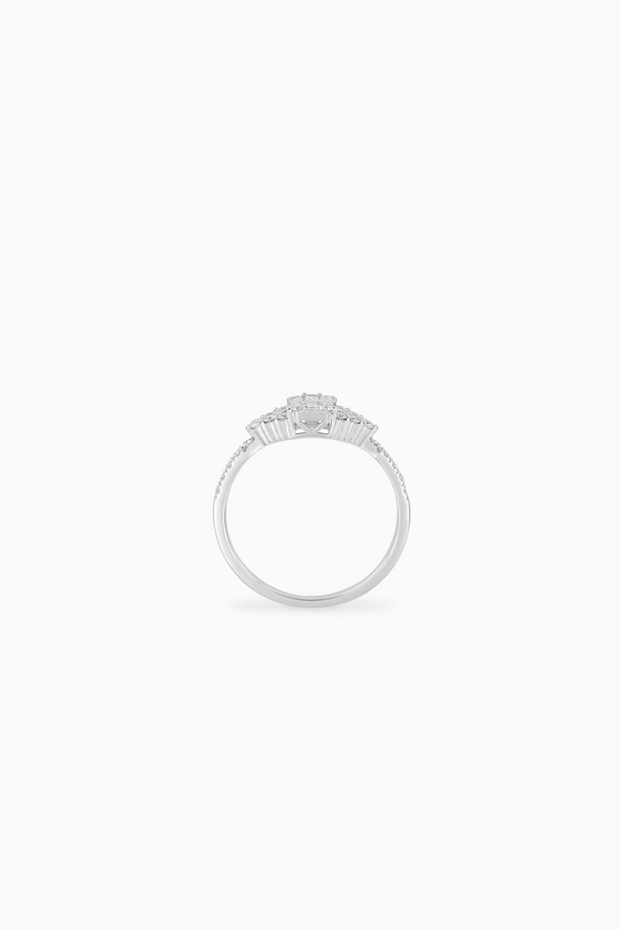 Silver ring with multiple gemstones on a white background